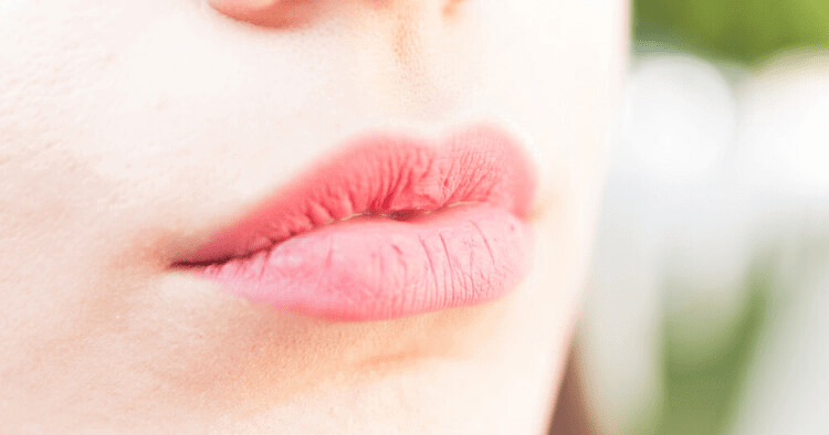 Applying Matte Lipstick On Dry Lips